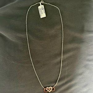 New with tag fine silver plated with Swarovski crystals infinity necklace